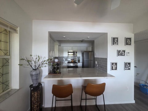 Tiny photo for 3271 NW 44th Street #5, Oakland Park, FL 33309 (MLS # B26076297)