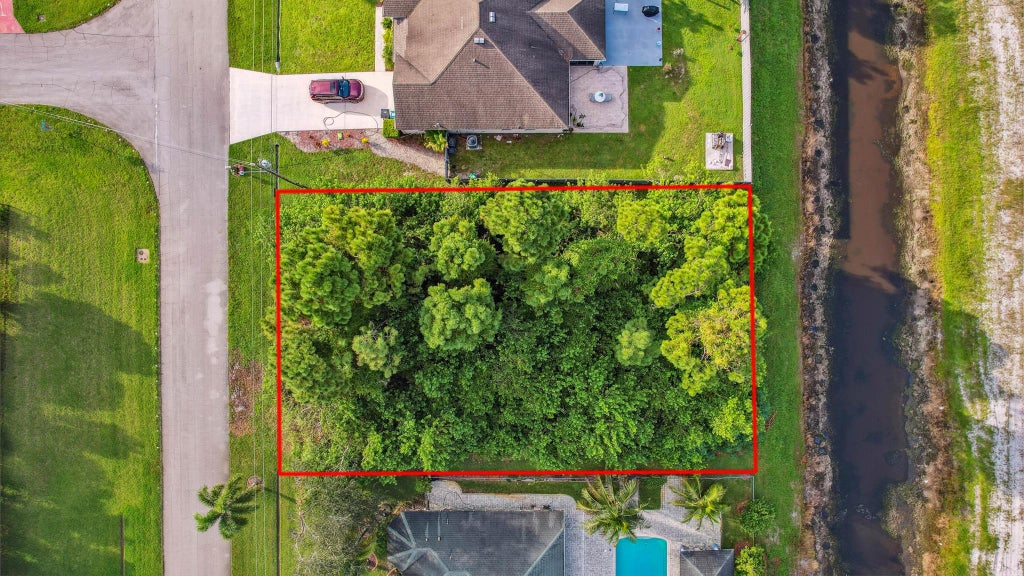 Photo of 320 SW Ridgecrest Drive, Port St Lucie, FL 34953 (MLS # R10915966)