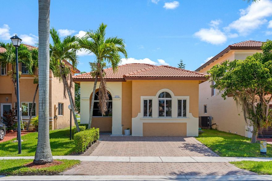 BRAND NEW PAINT!! READY TO MOVE IN!! Beautiful 3 bed, 2 bath single-family home for rent in the desirable Waterstone community in Miami. This home features tile floors throughout and an updated kitchen with modern finishes. Both the front and back of the home face lush green areas, offering added privacy. Enjoy a spacious backyard perfect for relaxing or entertaining. Located near top-rated schools.  Don’t miss this move-in ready gem in a peaceful, family-friendly neighborhood!