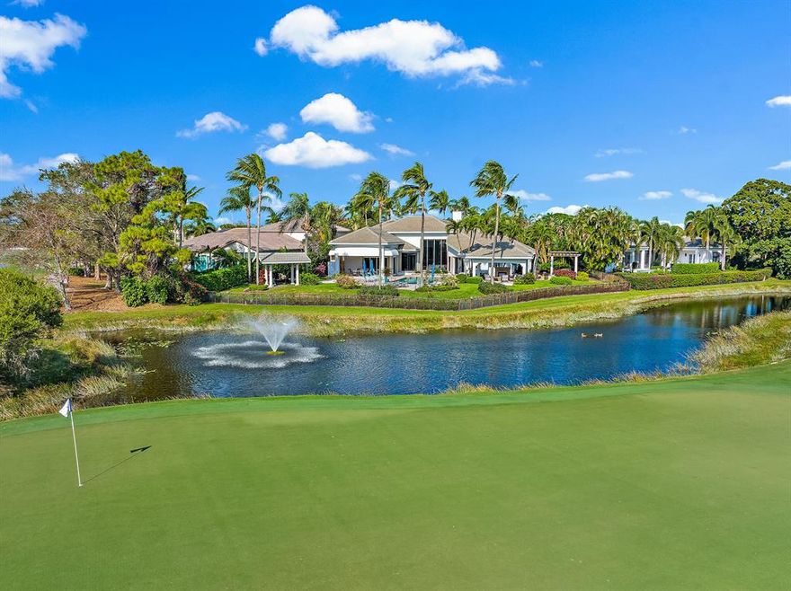 Located on one of the best lots in Admirals Cove, this large 1/2-acre site with approximately 153 feet of golf course and lake views. Abundant outdoor space make it ideal for entertaining.  Watch the sunset from your private backyard oasis featuring a majestic saltwater pool, separate spa, large, covered porch with summer kitchen, lanai with stone fireplace and mounted televisions, firepit area with plenty of seating and patio area all with wide lake and golf views. First floor has high ceilings, an abundance of natural lighting, a large great room that flows into an expansive kitchen and living room with ceramic tile floors. Formal dining room, tasteful home office, primary suite with direct patio access. 5th bedroom is being used as a theatre room. See supplement...