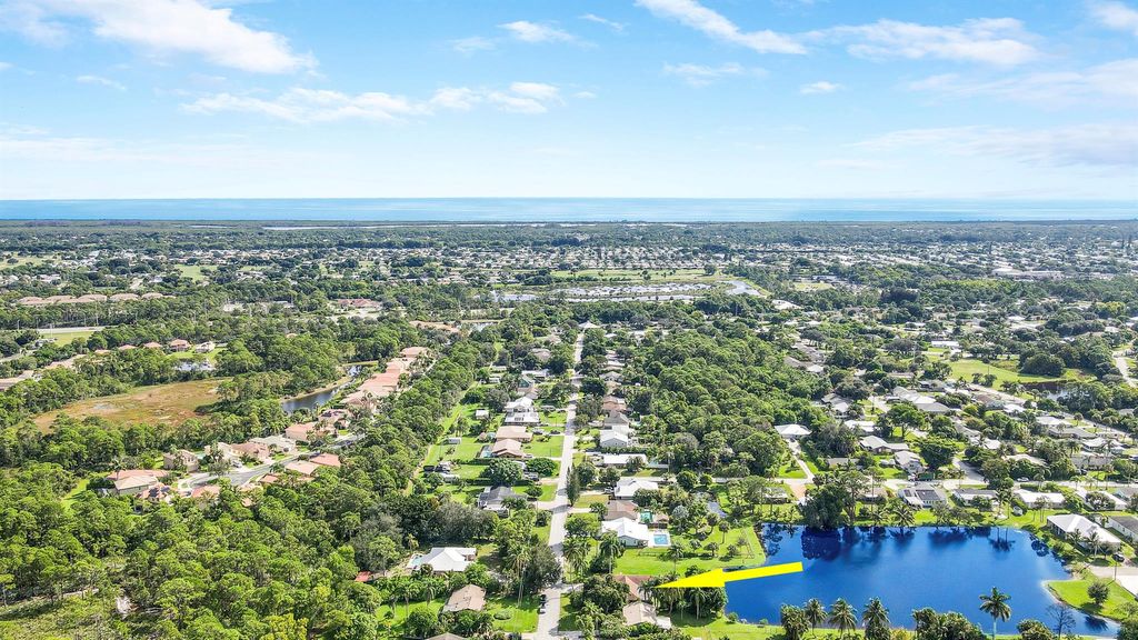 Photo of 5924 SE Orange Blossom Trail, Hobe Sound, FL 33455 (MLS # R11129101)