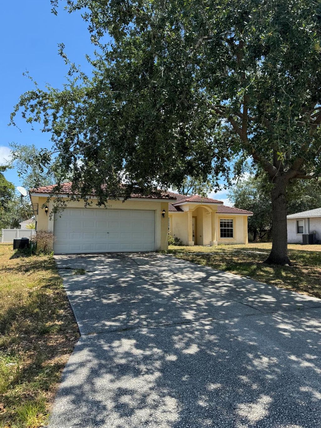 Photo of 1925 SW Aladdin Street, Port Saint Lucie, FL 34953 (MLS # R10983073)