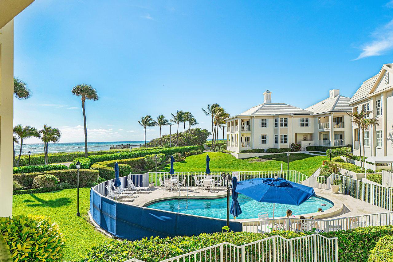 Oceanfront dream rental! Completely renovated interior, wood flooring, impact glass doors and windows, granite counters, custom cabinetry, appliances, marble bathrooms and interior trim. Private elevator from lower level deeded parking. All contained in a small community in Ocean Ridge, one of the best kept secrets in Florida. Deeded private beach complete with private beach dock, heated pool and tennis court in quiet, prestigious Ocean Ridge