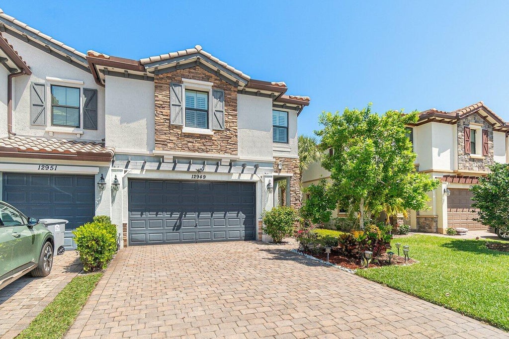 Photo of 12949 Anthorne Lane, Boynton Beach, FL 33436 (MLS # R11087457)