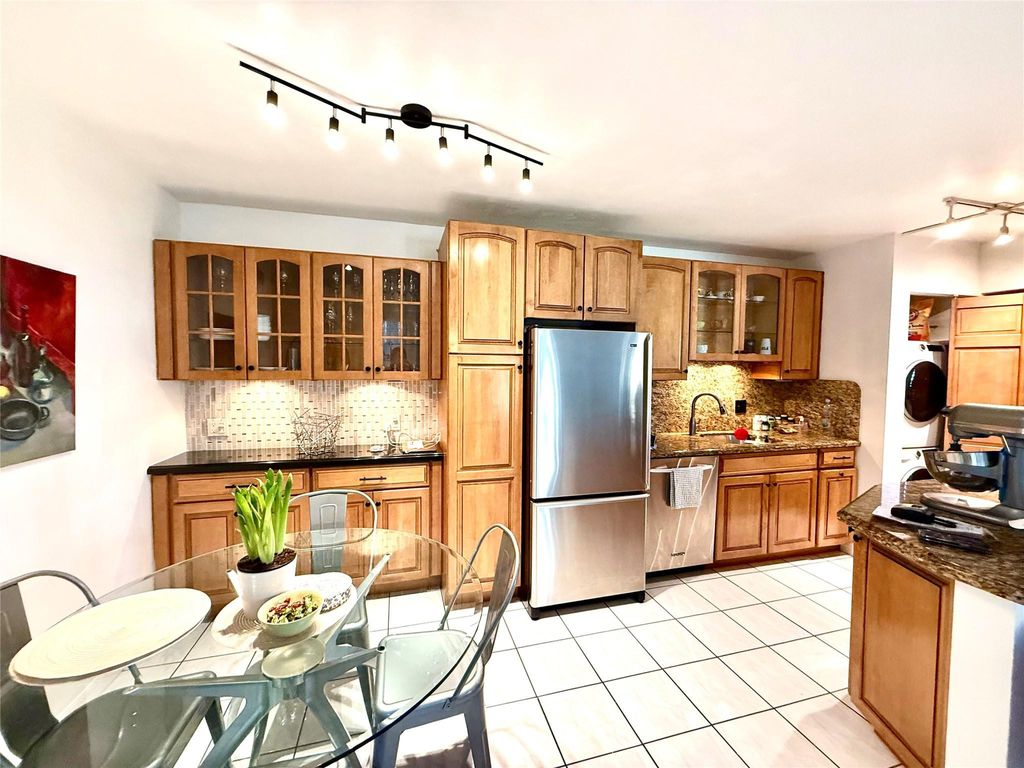 Photo of 677 Trace Circle #102, Deerfield Beach, FL 33441 (MLS # F10555247)