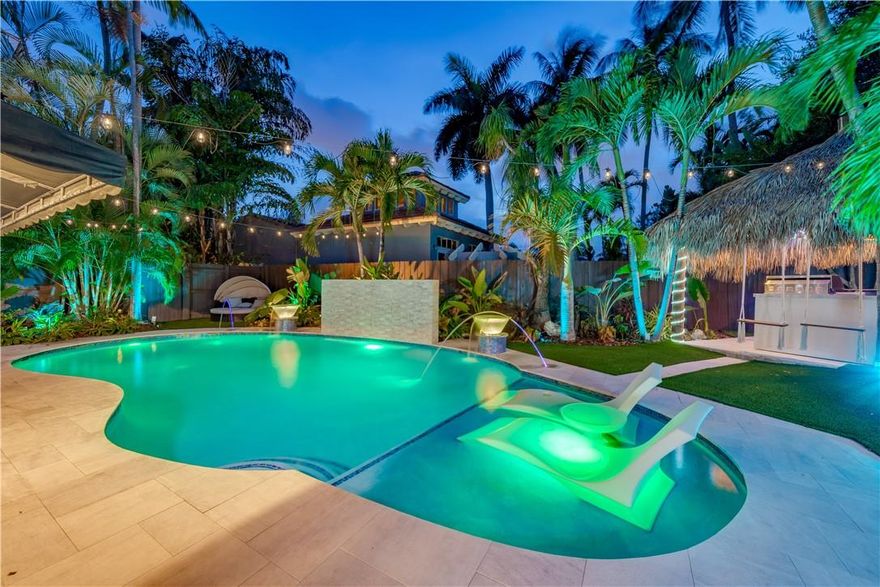 This Fully Appointed Vacation Rental. Pricing is Based on Desired Dates. This is an Urban Oasis that has OVER 500K in upgrades, including luxury touches, such as: high gloss reflective ceilings creating a unique living space, which complement the thoughtful décor and gorgeous accent walls. Smart home comes with power blinds and voice controlled lighting and audio. Swimming pool with a 5ft tall, 8ft wide waterfall, 2 Pentair Magic Bowls, a tanning shelf, two ledges and built in cooling fog machine. Gorgeous landscaping crafted by a celebrity landscaper, tiki hut, high end BBQ island, swing bar seats and hammock. Water filtration system. Walk or bike to everything - Beach/Las Olas/A1A Strip/FLIBS/Tortuga & MORE!! Rates vary based on dates/availability. Share dates, # occupants, # pets.