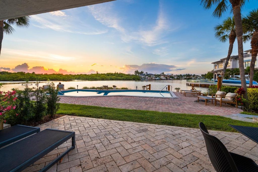 Photo of 1005 Bel Air Drive, Highland Beach, FL 33487 (MLS # R11120720)