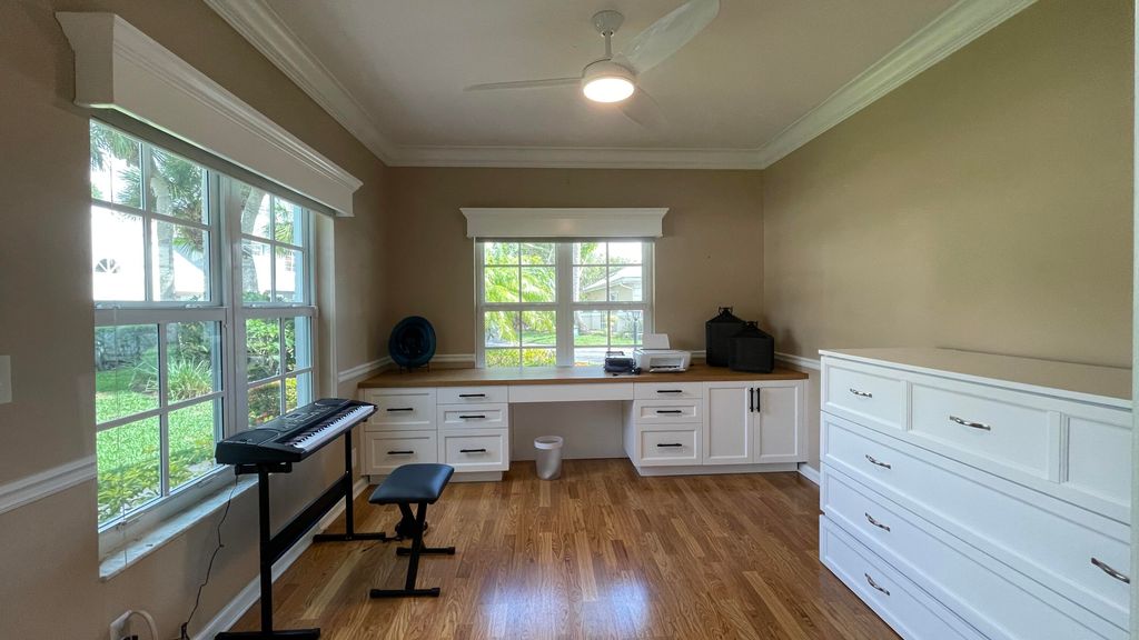 Photo of 230 Canterbury Drive W, Palm Beach Gardens, FL 33418 (MLS # R10943206)