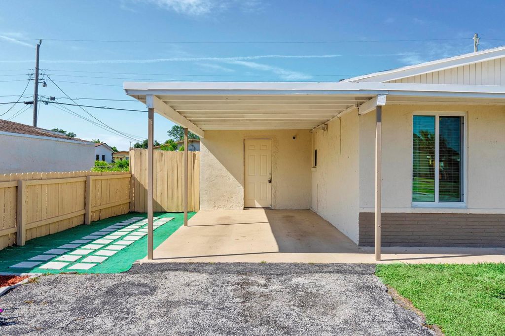 Photo of 1270 W 1st Street, Riviera Beach, FL 33404 (MLS # R10979283)