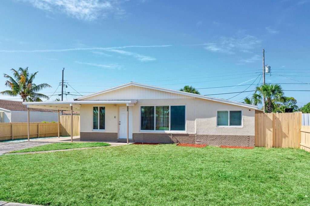 Photo of 1270 W 1st Street, Riviera Beach, FL 33404 (MLS # R10979283)