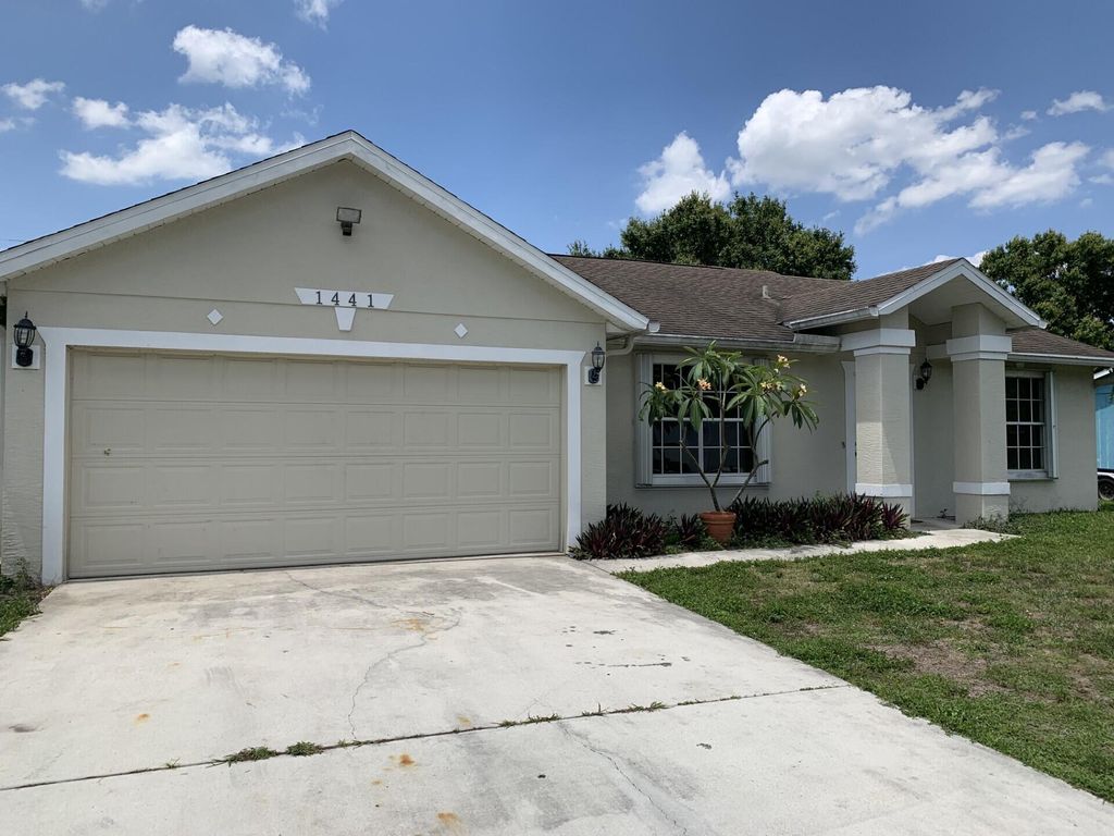Photo of 1441 SW Medina Avenue, Port St Lucie, FL 34953 (MLS # R11093110)