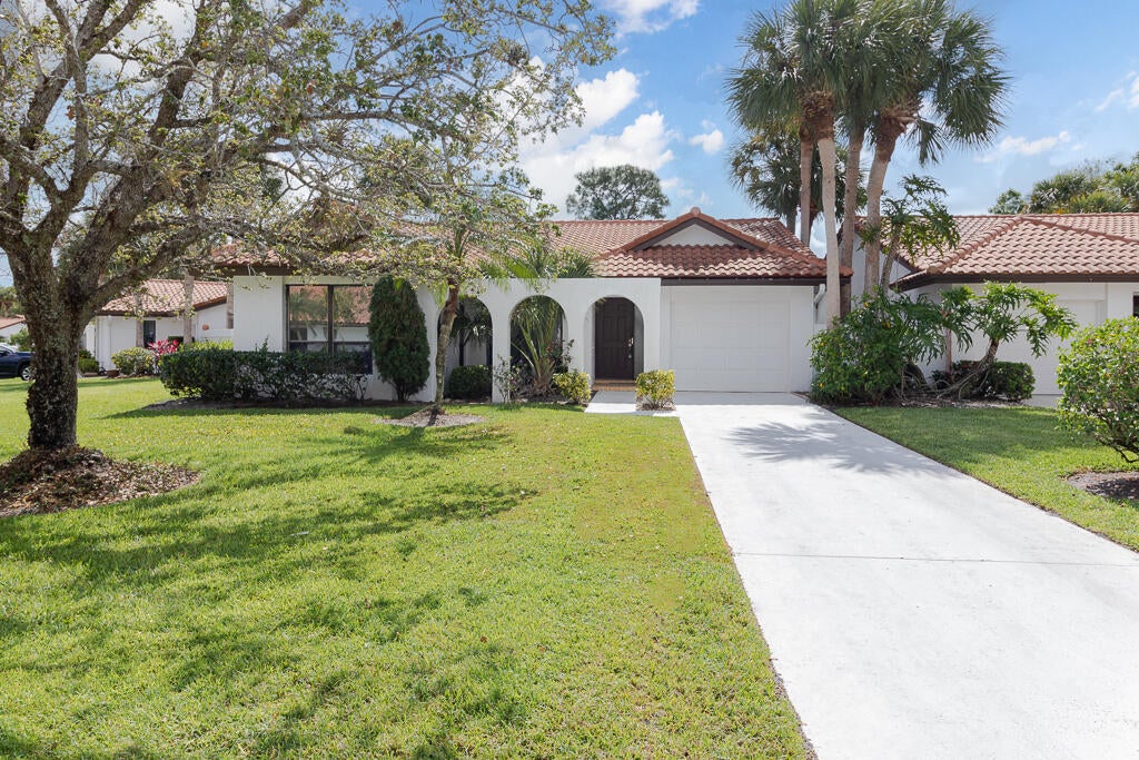 Photo of 3803 SW Osprey Creek Way, Palm City, FL 34990 (MLS # B26072721)