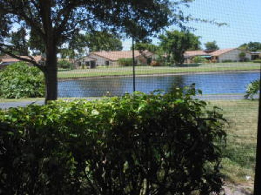 COMPLETELY RENOVATED light and bright villa in 55+ Rainberry Bay available for season ON THE LAKE!!!  Totally updated unit with tile floors throughout, new kitchen, new appliances, new baths, new A/C, new W/H!!!  And it's on the water!!  Vaulted kitchen ceiling with high window, large screened in patio, part open, part covered.  Rainberry Bay offers a magnificent active clubhouse, theatre, tennis and so much more!!  Bring your fussiest tenants!!!