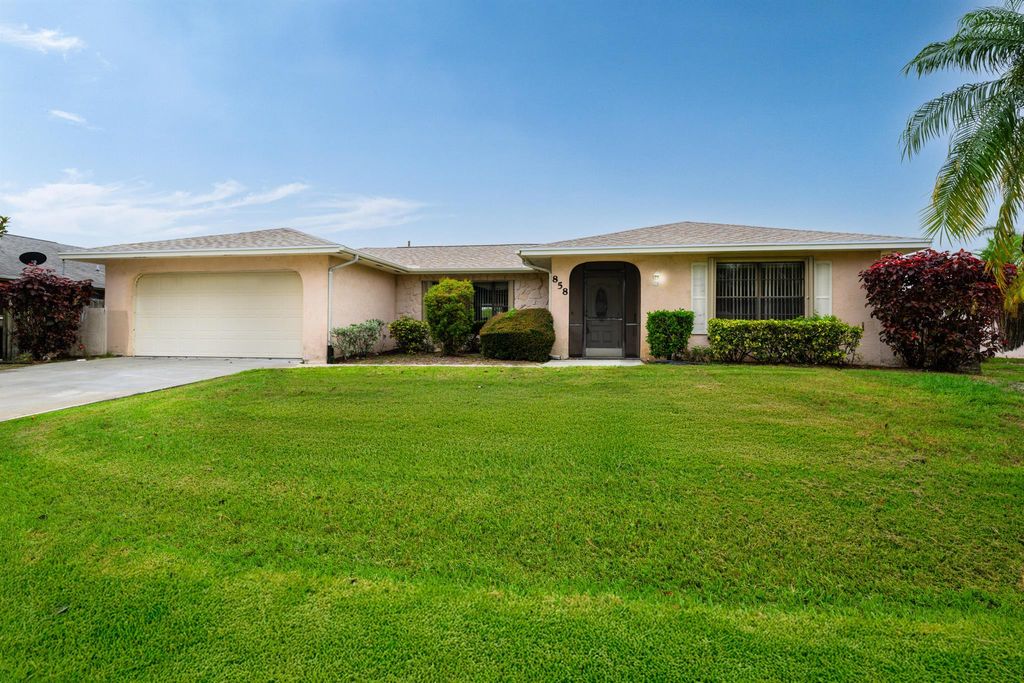 Photo of 858 SE Roulette Lane, Port Saint Lucie, FL 34983 (MLS # R11096752)