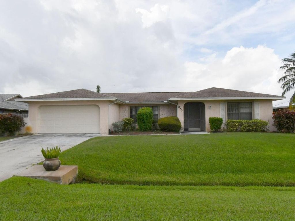 Photo of 858 SE Roulette Lane, Port Saint Lucie, FL 34983 (MLS # R11096752)