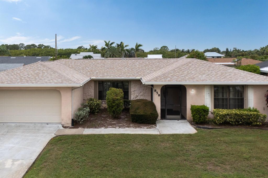 Photo of 858 SE Roulette Lane, Port Saint Lucie, FL 34983 (MLS # R11096752)