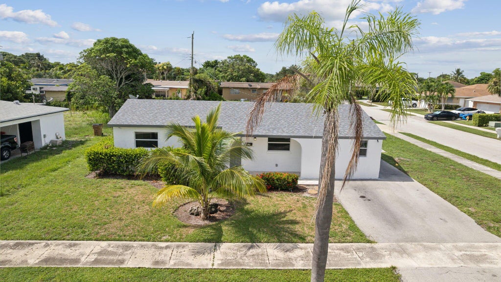 Photo of 110 NE 6th Street, Deerfield Beach, FL 33441 (MLS # R11012812)