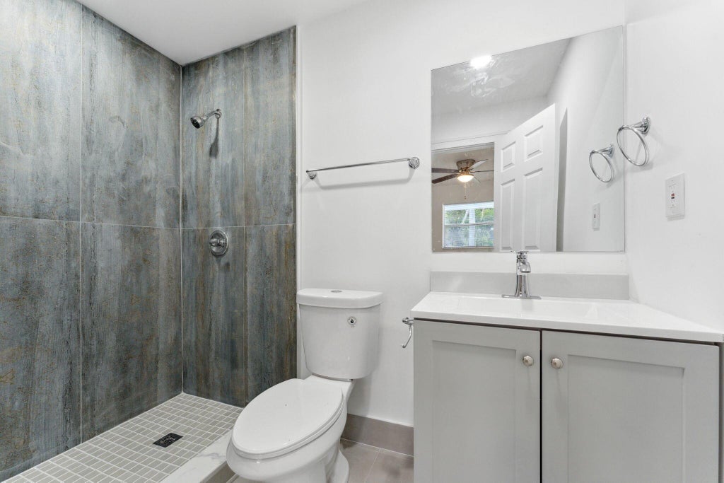 Photo of 110 NE 6th Street, Deerfield Beach, FL 33441 (MLS # R11012812)