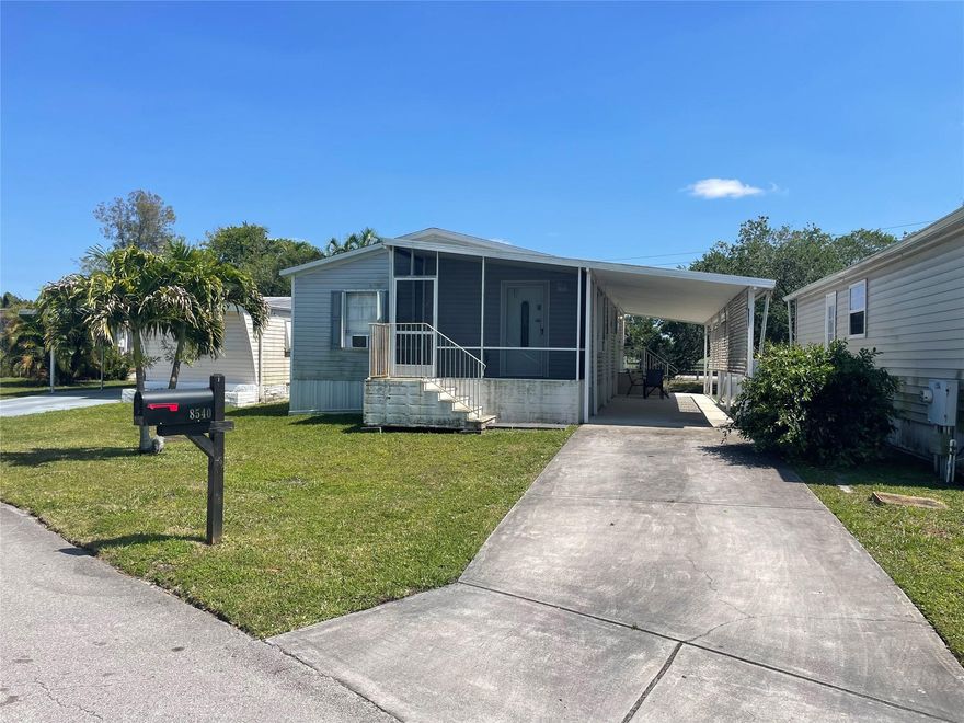 Absolutely gorgeous 3/2 double wide  built in 2006 - 3rd bedroom can be an office/bedroom - -with carport - shed - screened in area - -split bedroom plan - eat in kitchen - -beautiful floors through out - on canal- - newer stainless steel appliances - -updated kitchen cabinets - -great curb appeal - assoc. states it is HOPA verified - -truly a must see.....***** Buyer must sign FRPTA addendum*****