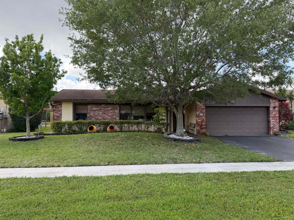Photo of 9500 NW 31ST Place, Sunrise, FL 33351 (MLS # B26060916)