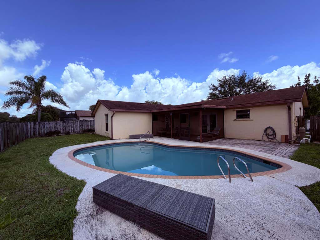 Photo of 9500 NW 31ST Place, Sunrise, FL 33351 (MLS # B26060916)