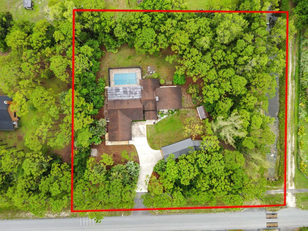 Photo of 13618 Persimmon Boulevard, West Palm Beach, FL 33411 (MLS # R11104647)