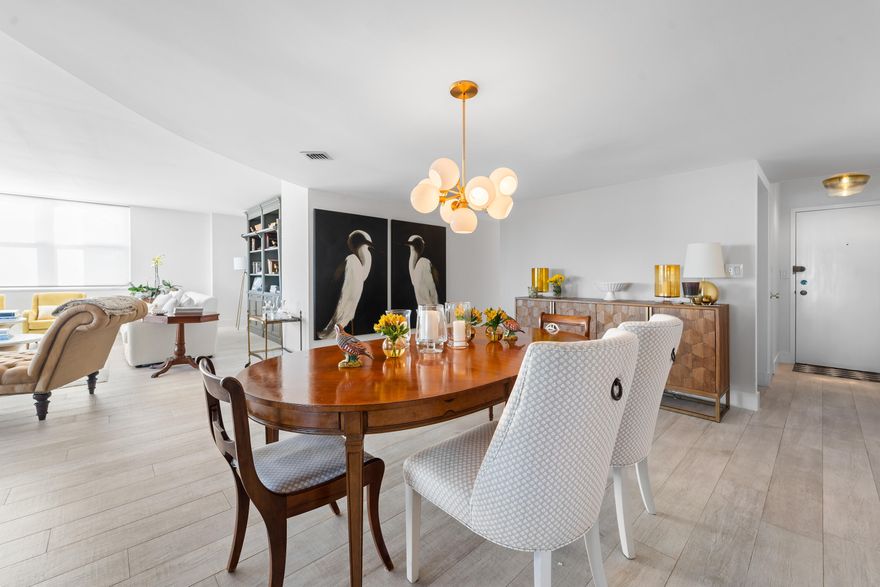 Experience the pinnacle of waterfront living in this meticulously redesigned residence.  Originally a 3 bedroom layout, Unit 402 has been artfully converted into an expansive  2 bedroom, prioritizing open space, natural light and beautiful views. Minutes to Palm Beach and all that West Palm Beach has to offer.