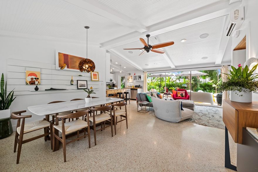 New price reduction for immediate sale! Mid-century modern home meets contemporary! Welcome to tranquil private retreat w/ interior designer finishes.  This charming one story villa is an Oasis of nature with many mature palms and gorgeous oak tree! Great opportunity for investors as the house is licensed for short term rental w/ verifiable numbers. $150k spent on upgrades in 2023! Some of the features include: brand new baths, new PVC pipes, brand new AC units, impact doors and windows, salt water heated pool with underwater LED lights, polished original terrazzo floors, new landscaping, new metal roof, iPhone controlled smart home system, cameras & sound system and many more! - all minutes from downtown, Brightline and I-95 in park like setting of prestigious Gill Isles neighborhood.