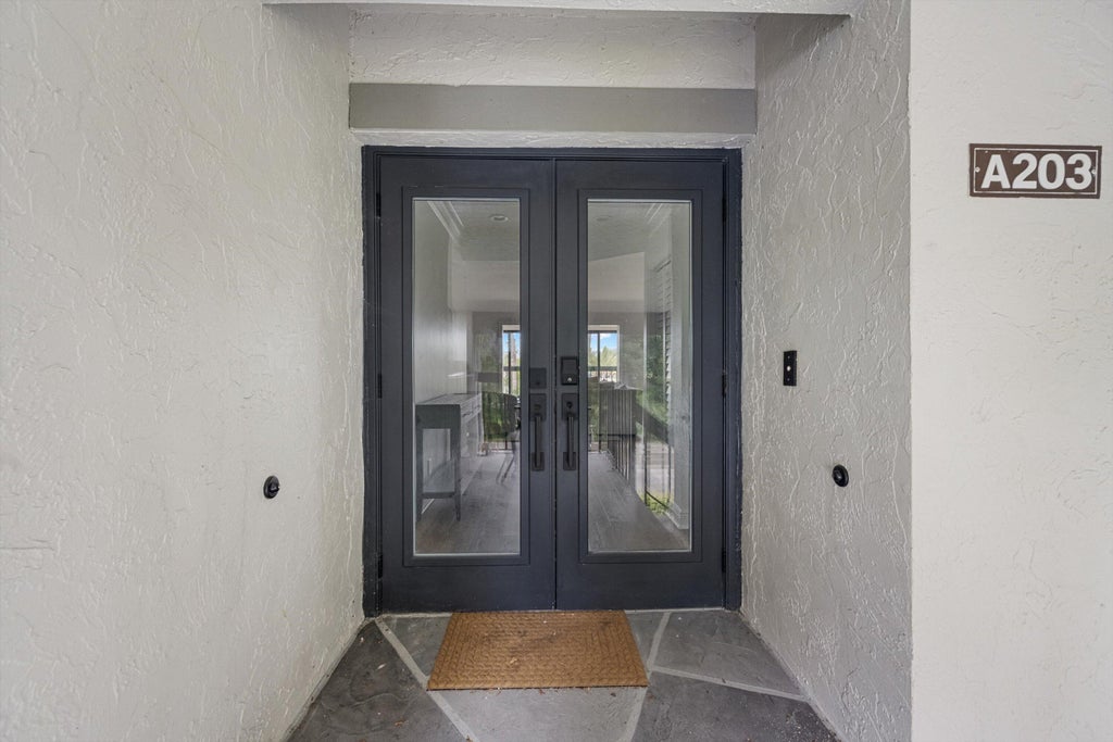 Photo of 11223 Pond View Drive #A203, Wellington, FL 33414 (MLS # B26046584)