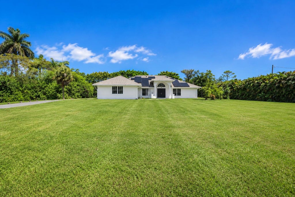 Photo of 16613 61st Place N, Loxahatchee, FL 33470 (MLS # B26066738)