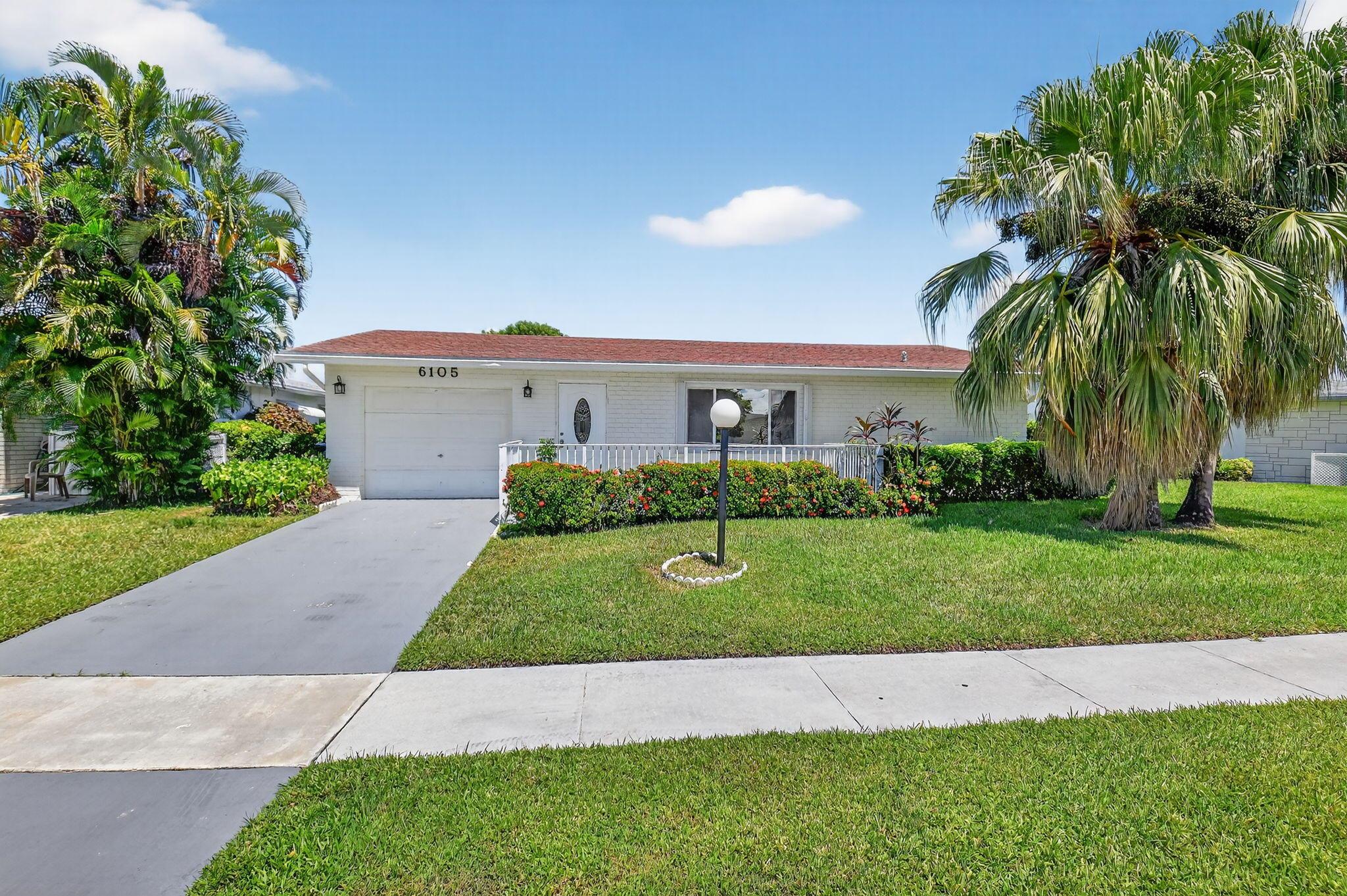 Beautifully updated lakefront single-family home in the desirable 55+ Delray Villas community! This solid concrete construction home features 3 bedrooms, 2 bathrooms, a 1-car garage (new door coming soon), and stunning water views. Recent upgrades include a 2017 roof, 2020 A/C, new flooring throughout, a modern kitchen with granite countertops, and stylishly renovated bathrooms. Enjoy an active lifestyle with community amenities including a pool, fitness center, clubhouse activities, and more--all just minutes from shopping, dining, and beaches.