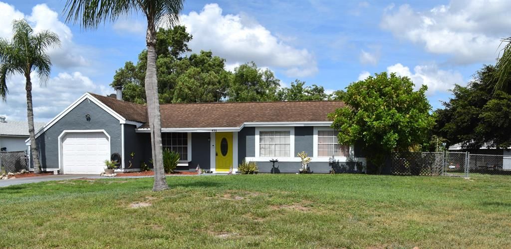 Photo of 498 SW Eastport Circle Cir, Port Saint Lucie, FL 34953 (MLS # R10808485)