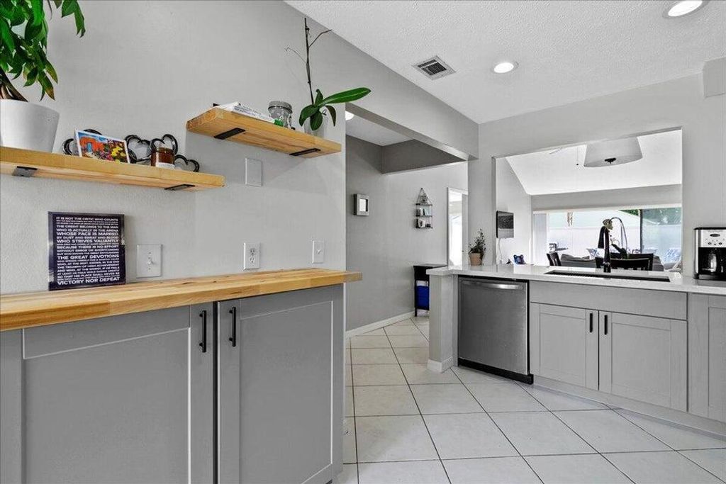 Photo of 12875 Spinnaker Lane, Wellington, FL 33414 (MLS # B26021370)