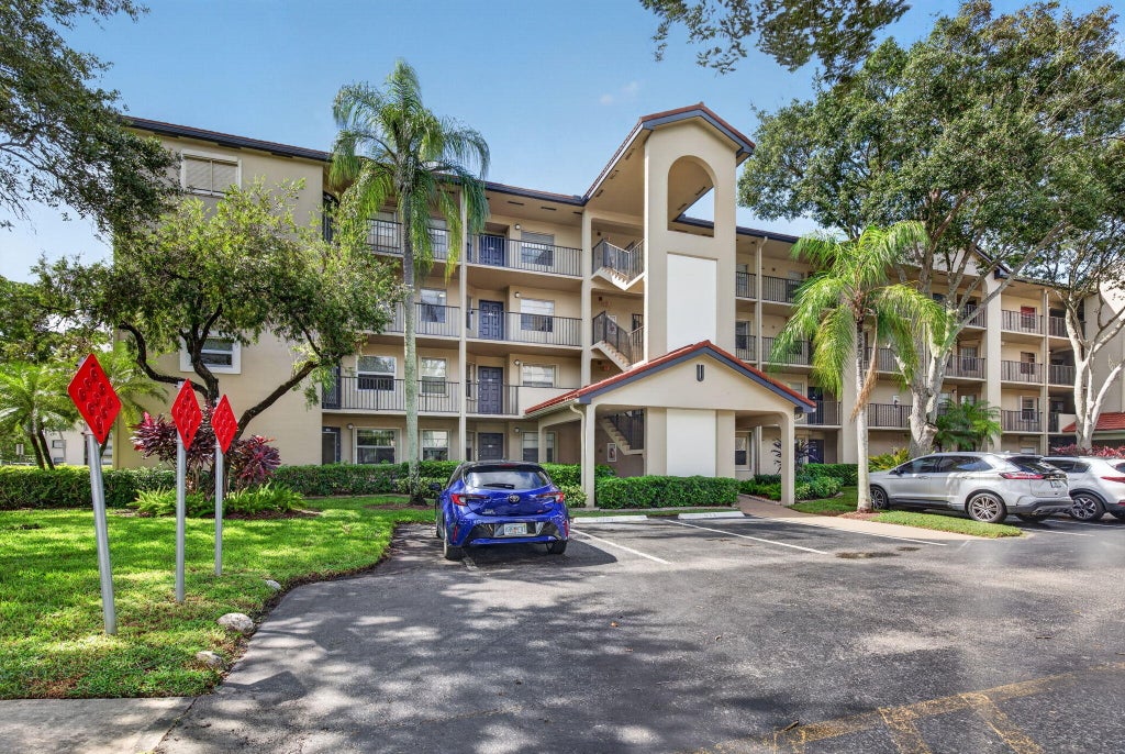 Photo of 1100 SW 128TH Terrace #302U, Pembroke Pines, FL 33027 (MLS # B26094282)