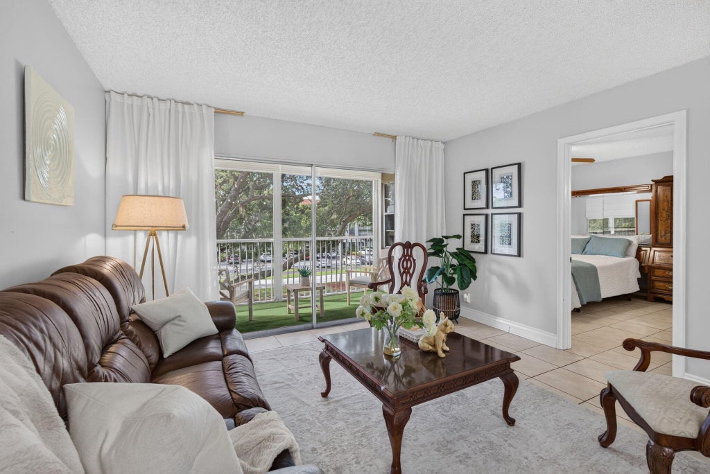 Photo of 1100 SW 128TH Terrace #302U, Pembroke Pines, FL 33027 (MLS # B26094282)