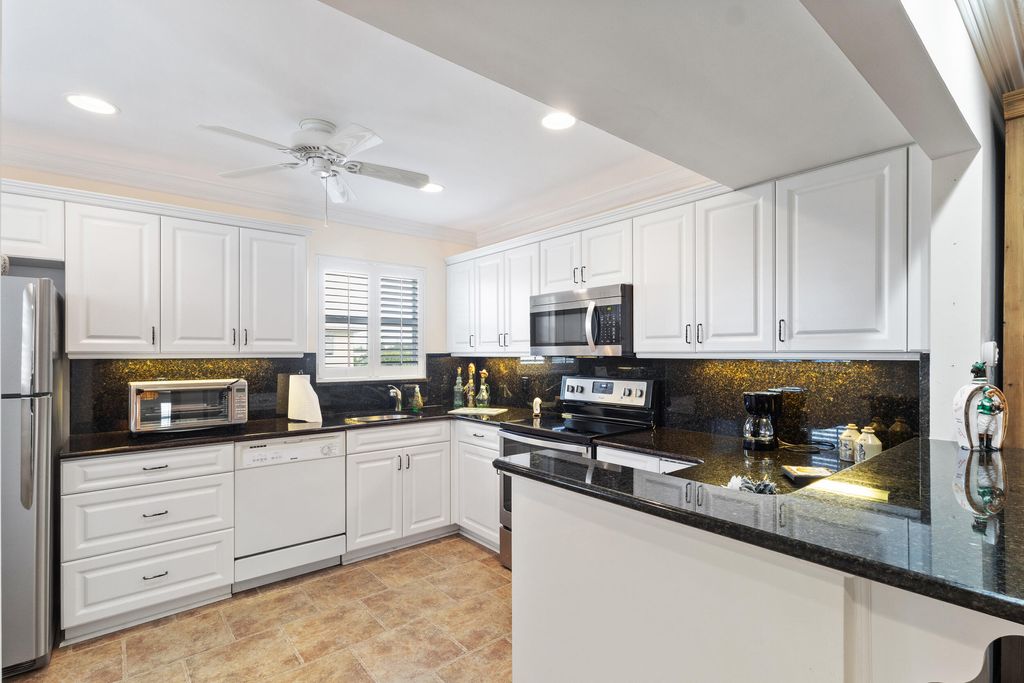 Photo of 14 Colonial Club Drive #300, Boynton Beach, FL 33435 (MLS # R11141835)