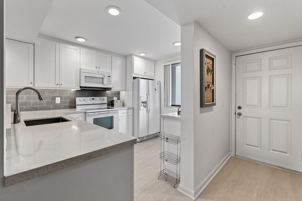 Photo of 101 S Seas Drive #101, Jupiter, FL 33477 (MLS # R11122067)