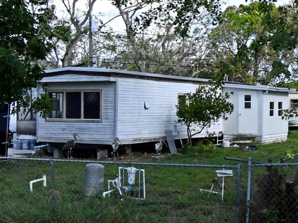 Photo of 1208 W Joy Lane, Fort Pierce, FL 34950 (MLS # R10940561)