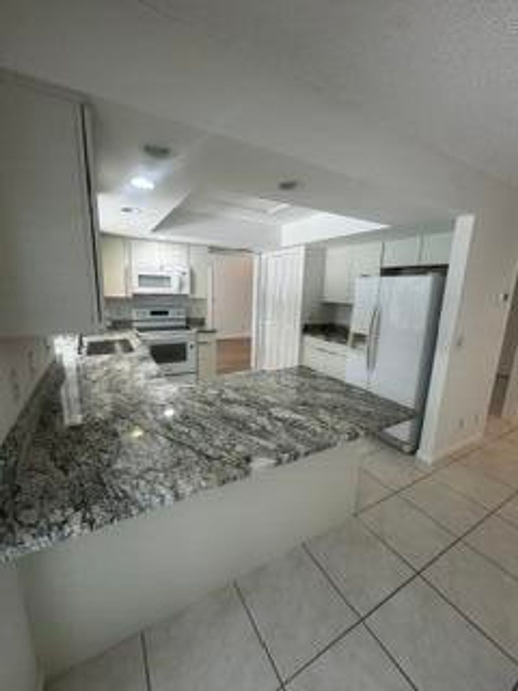 Photo of 441 Sunrise Way, Juno Beach, FL 33408 (MLS # B26027457)