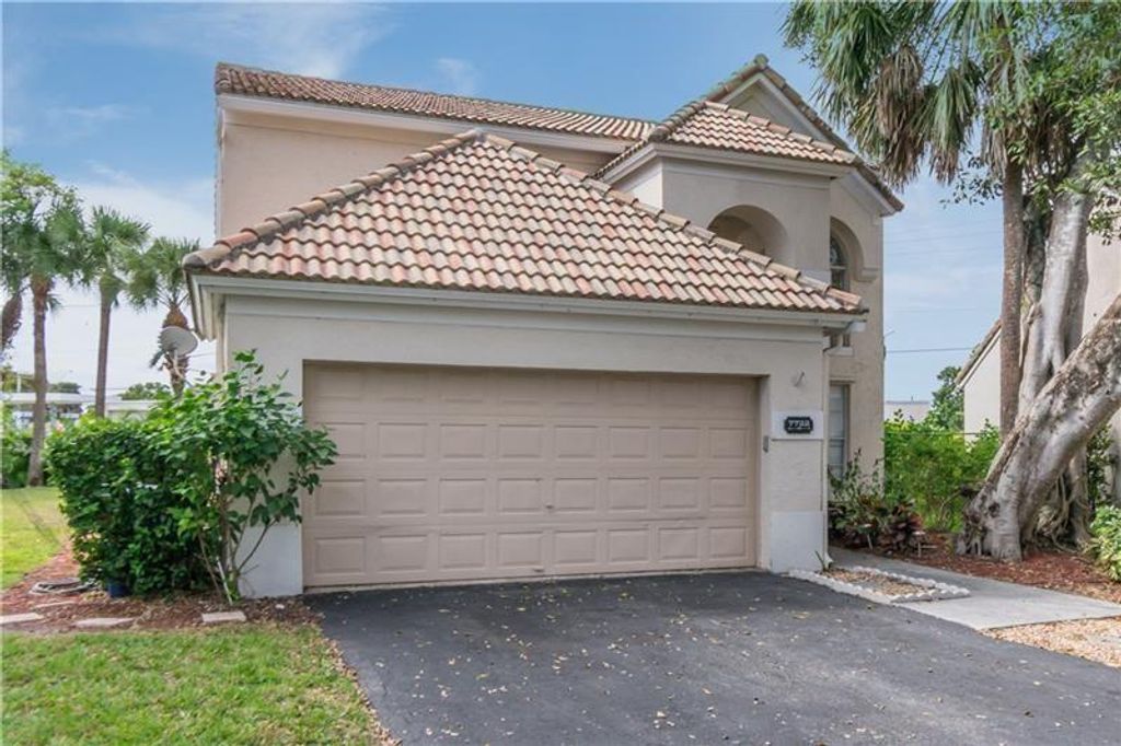 Photo of 7722 Hibiscus Lane, Coral Springs, FL 33065 (MLS # F10513364)