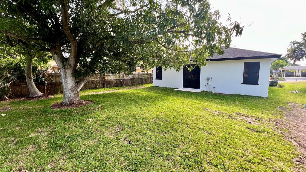 Photo of 1580 W 32nd Street, Riviera Beach, FL 33404 (MLS # R11146045)