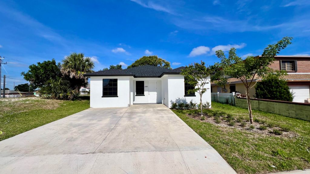 Photo of 1580 W 32nd Street, Riviera Beach, FL 33404 (MLS # R11146045)