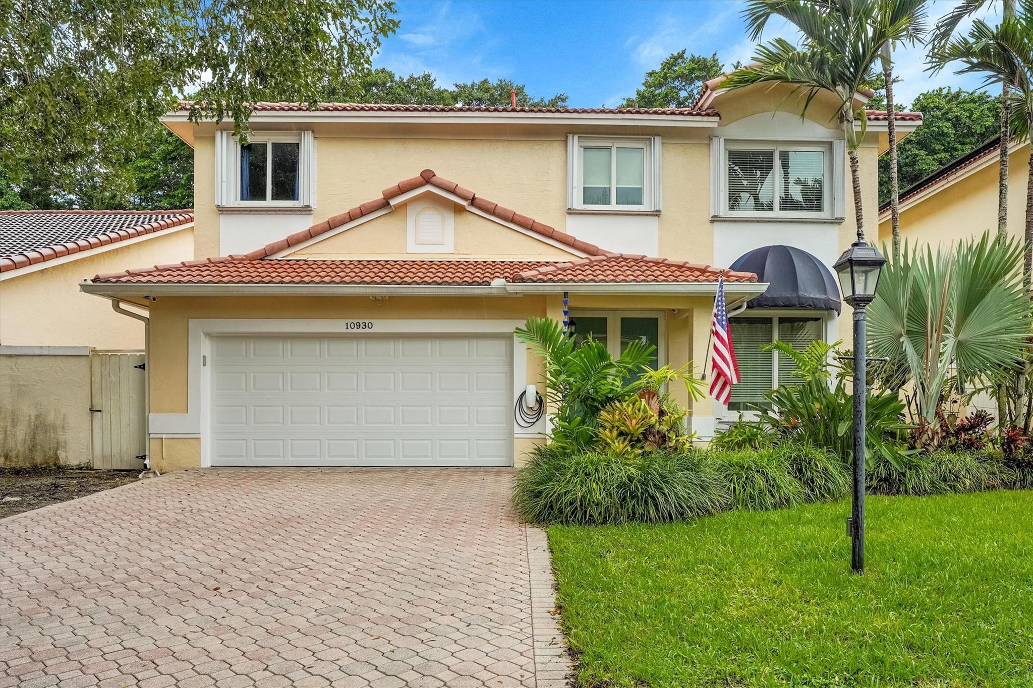 Stunning, beautifully remodeled 4-bedroom, 2.5-bath, two story home located in the desirable gated community in the Hammocks! This stunning property features elegant tile flooring throughout, French doors, a modern open-concept kitchen, spacious living areas, and a second-floor balcony. Gas appliances, central vacuum cleaner system and a modern design that blends comfort and style. Equipped with complete storm impact windows offering peace of mind. Manicured grounds with no backyard neighbors!  Enjoy your private backyard oasis with a partial covered patio and sparkling pool perfect for relaxing or entertaining. Nestled in one of southwest Miami’s most sought-after neighborhoods, this home offers resort-style living with access to parks, walking trails, and top-rated schools.