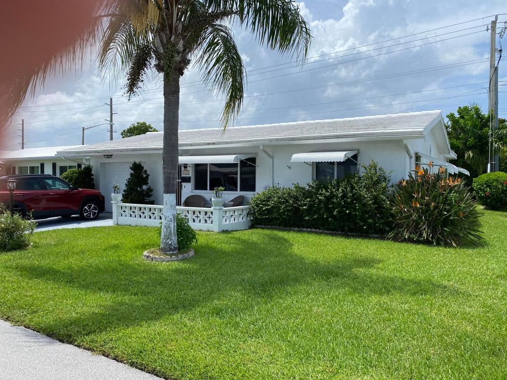 Photo of 1101 Leisure Lane, Boynton Beach, FL 33426 (MLS # B26044156)