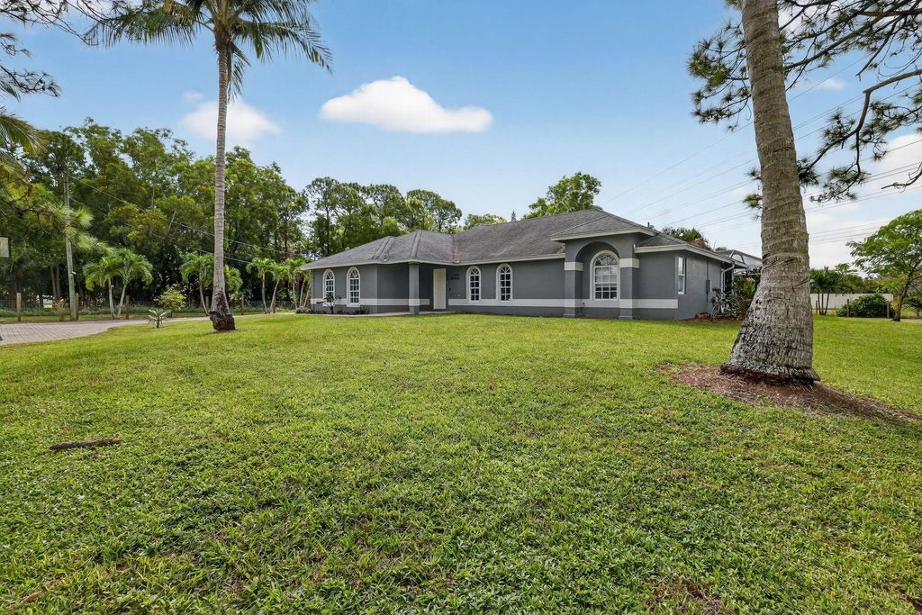Photo of 14316 74th Street N, Loxahatchee, FL 33470 (MLS # R11126632)