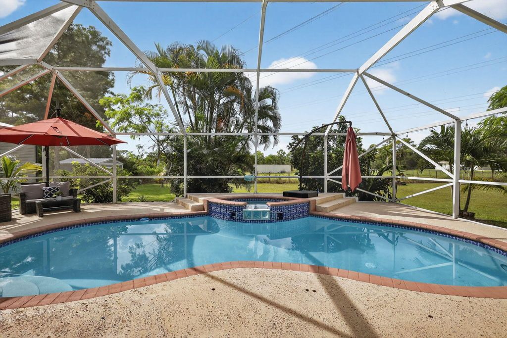 Photo of 14316 74th Street N, Loxahatchee, FL 33470 (MLS # R11126632)