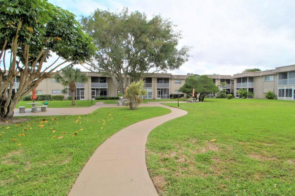 Photo of 210 Oxford 200 Drive, West Palm Beach, FL 33417 (MLS # R10904604)