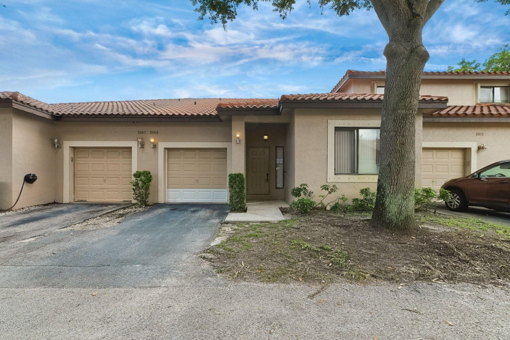 Photo of 3069 LA MIRAGE Drive, Lauderhill, FL 33319 (MLS # B26085609)