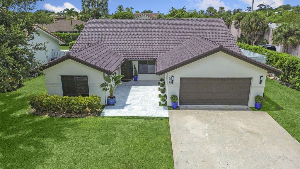 Photo of 1598 SW 19th Street, Boca Raton, FL 33486 (MLS # R11100571)