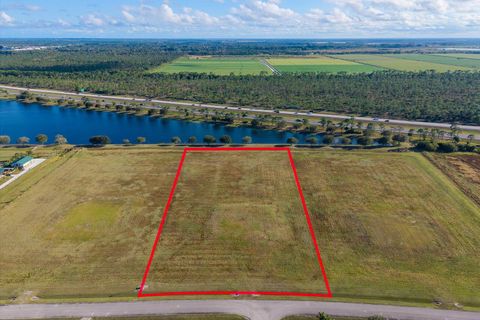 Photo of 3150 SW Briarbrook Way, Palm City, FL 34990 (MLS # R11157964)